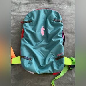 cotopaxi Teal Backpack with Pink Logo and Neon Green Straps